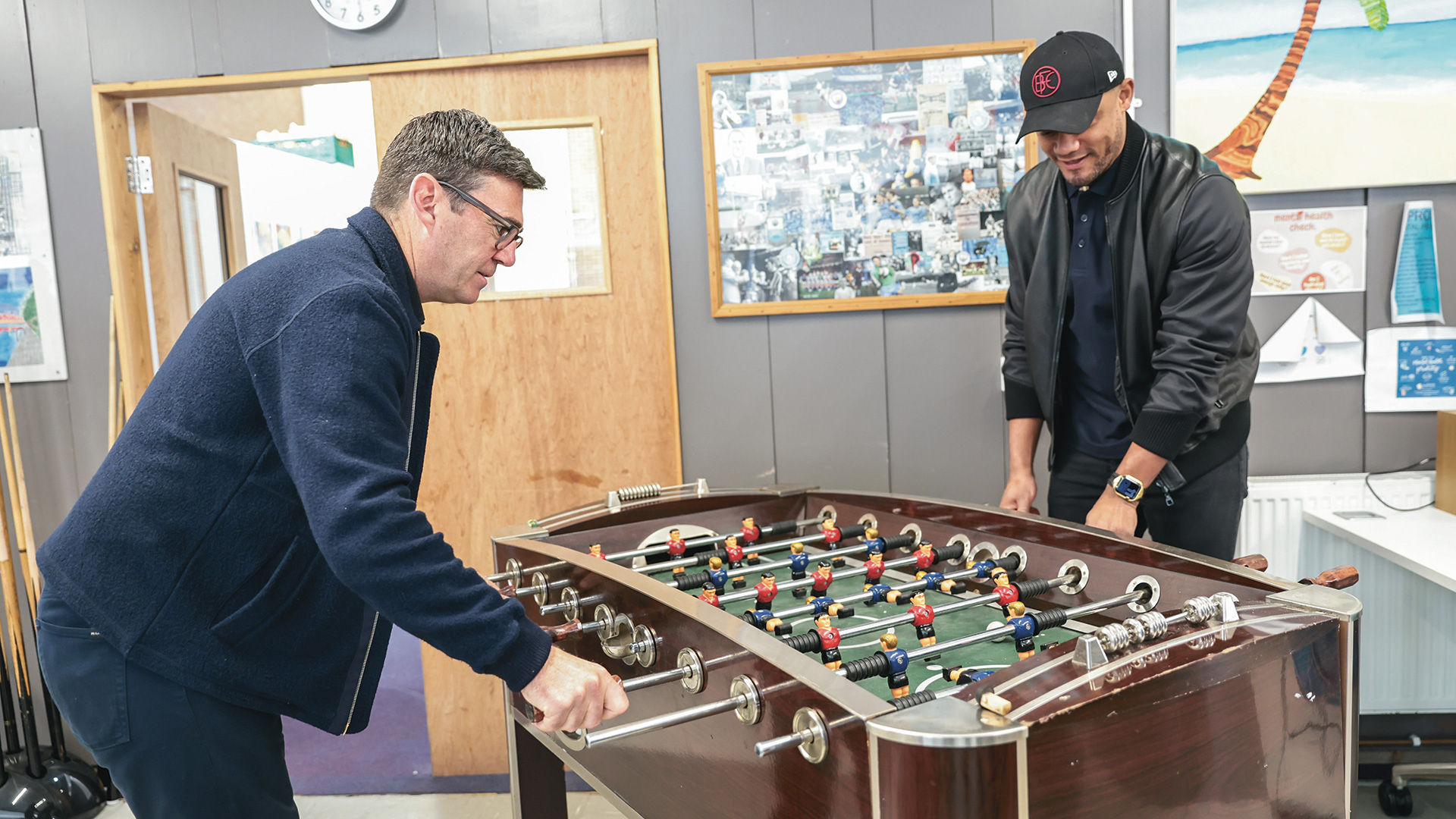 Andy Burnham and Vinvent Kompany play table football