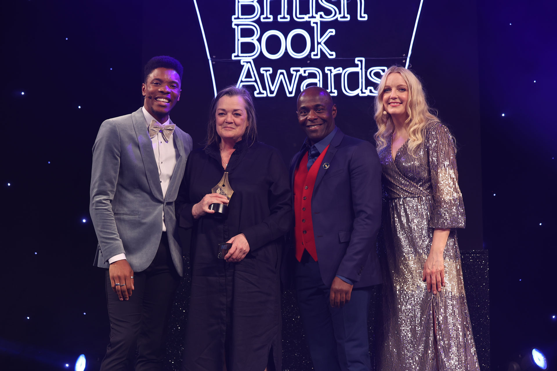 EDITORIAL USE ONLY Rhys Stephenson, Louise Kennedy, Paterson Joseph, Lauren Laverne at The British Book Awards 2023 ceremony. Photo: British Book Awards