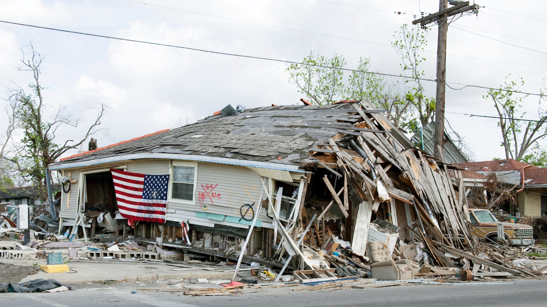 a house in New Orleans ruined by hurricane katrina, and would likely have killed the people inside if they weren't evacuated, which they may not have been if they were disabled