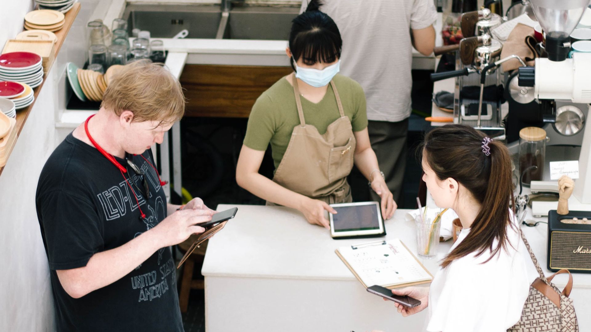 Customer tipping staff in a restaurant