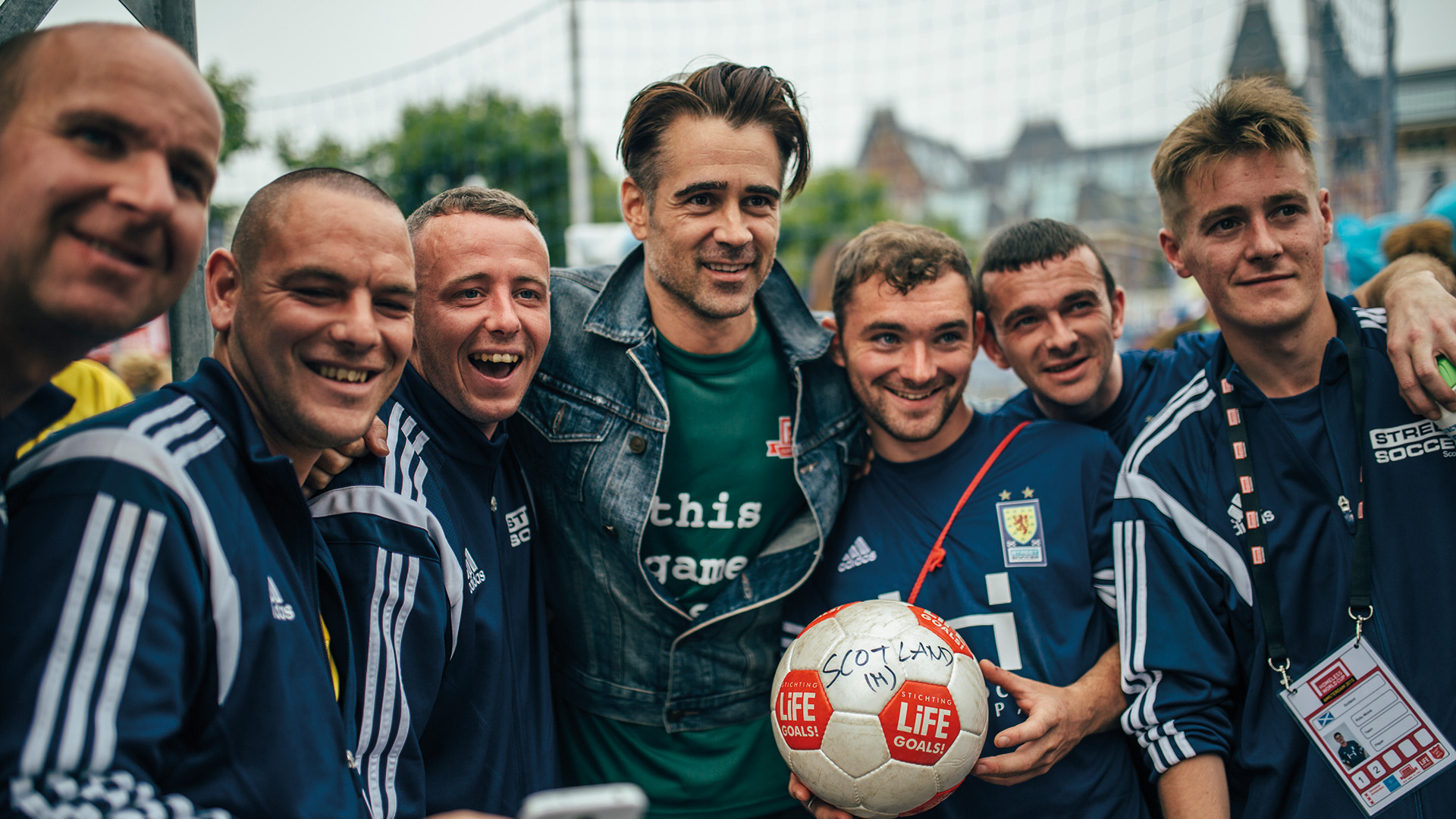 Colin Farrell with the Scottish team, holding a football