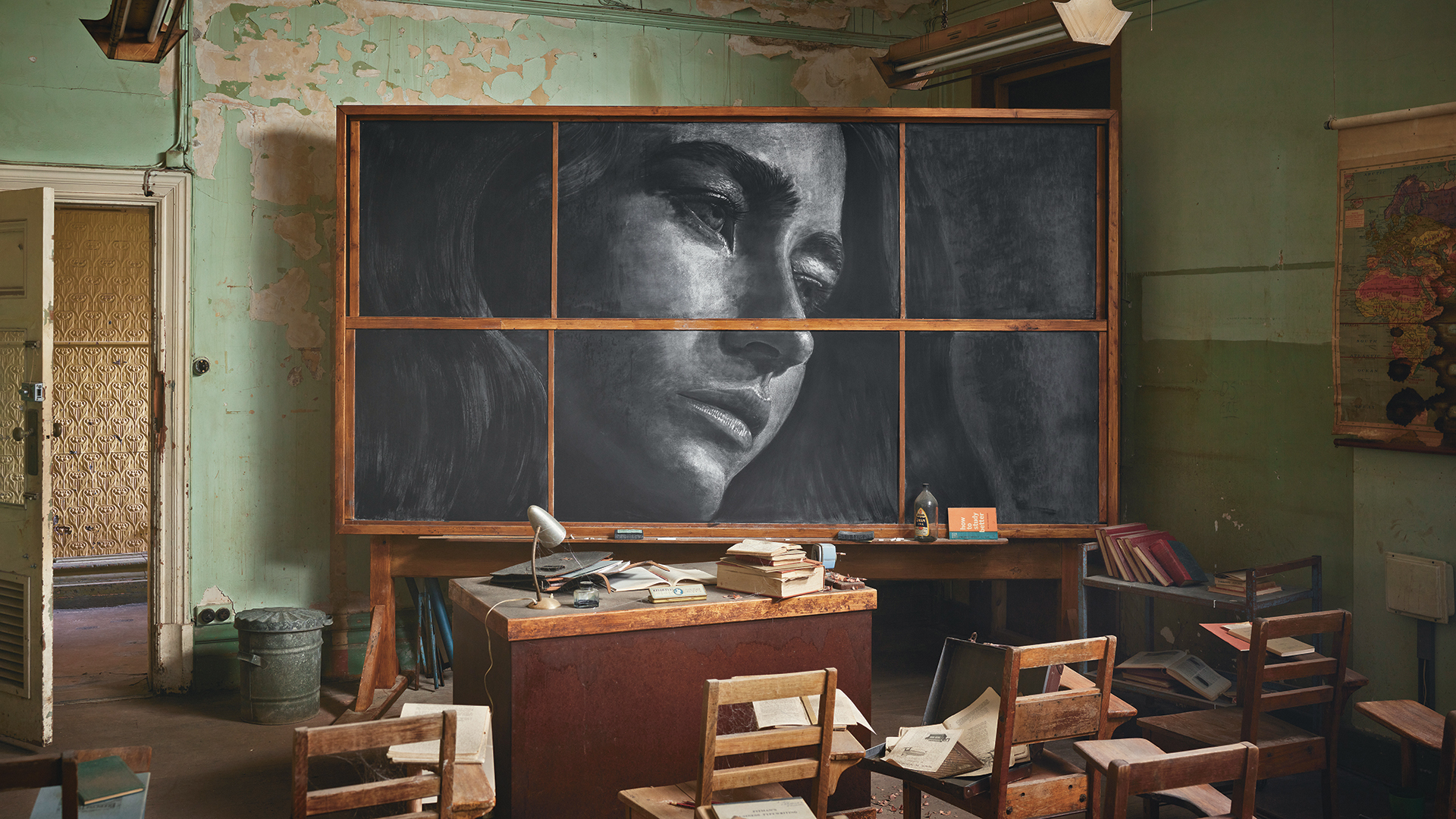Painting of a woman's face in a room