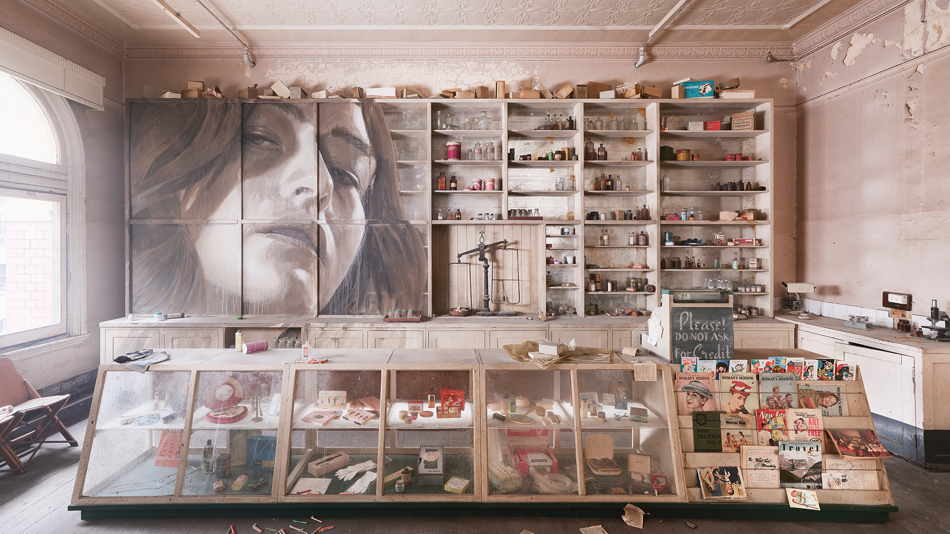 A woman's face painted into shelves