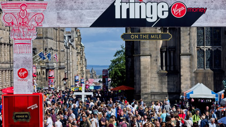 A packed Royal Mile during the Edinburgh Festival Fringe, Scotland, UK
