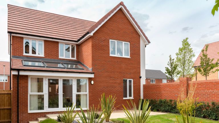 A house in the Millbank Lock development – newbuild, red brick family home.