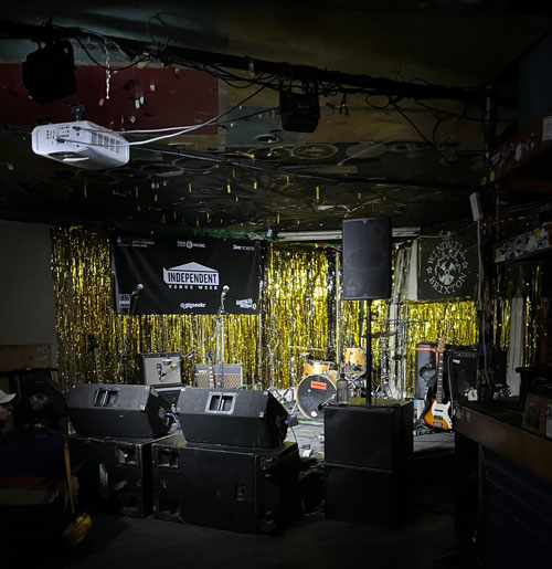 The stage of the Windmill with its sparkly backdrop