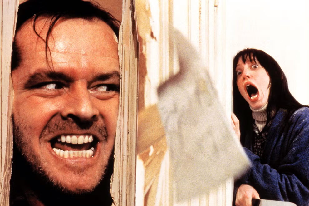 Jack Nicholson as Jack Torrance menacing his wife Wendy (Shelley Duvall) through a door with an axe in one of Duran Duran's favourite horror films