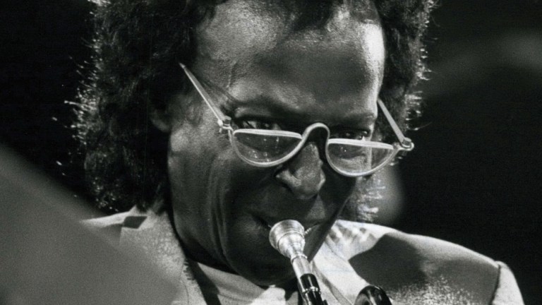 Miles Davis playing onstage