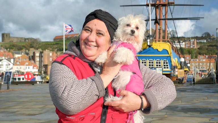Big Issue vendor Lacramoira with her dog