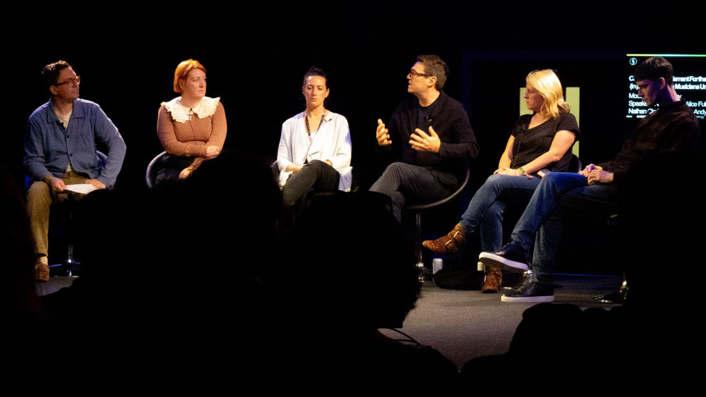 Andy Burnham talking to a panel, discussing live music at Beyond The Music