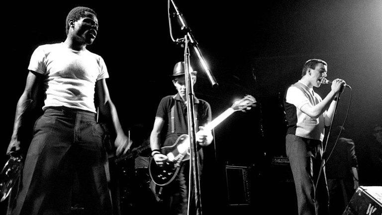 2 Tone stars The Specials on stage in a black and white photo