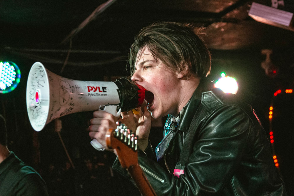 Yungblud singing into a megaphone