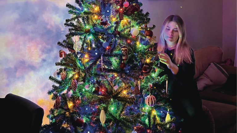 Christmas tree being decorated