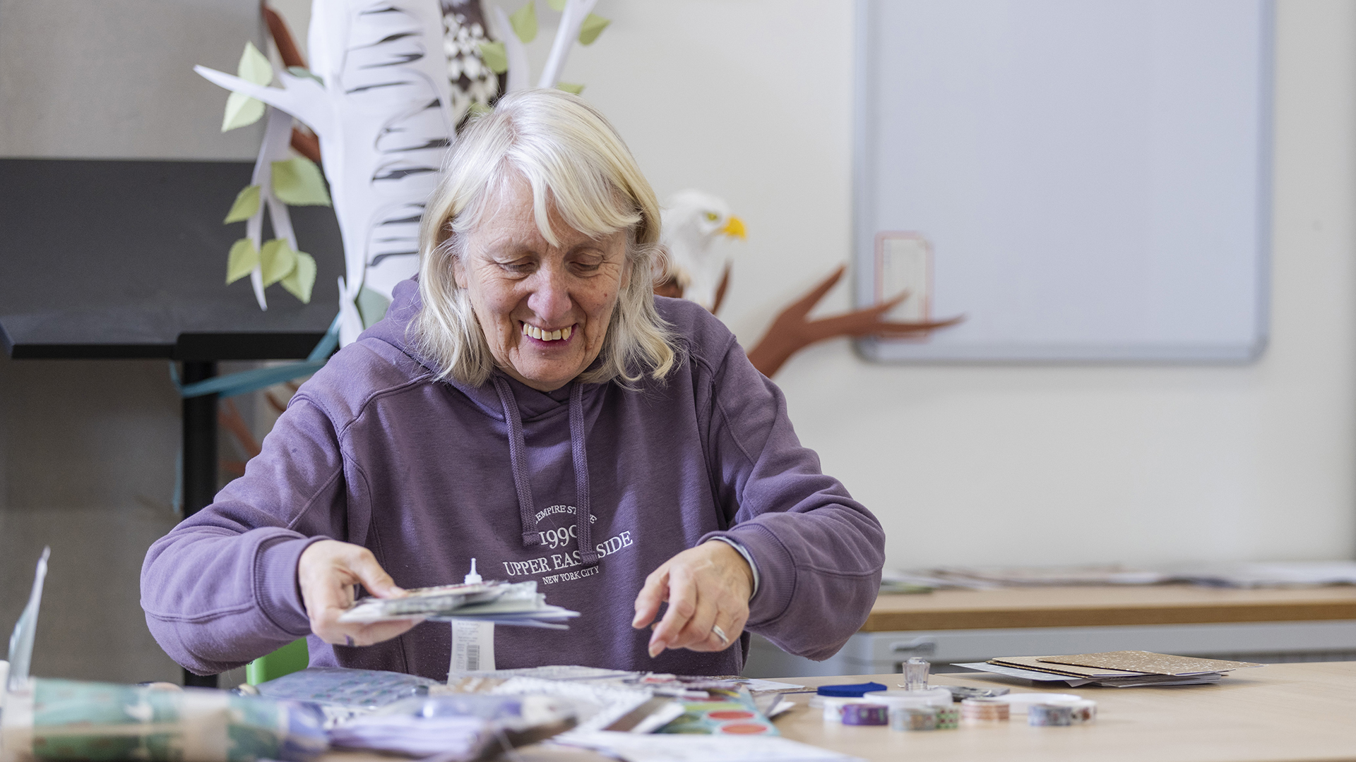 A woman at a library craft class