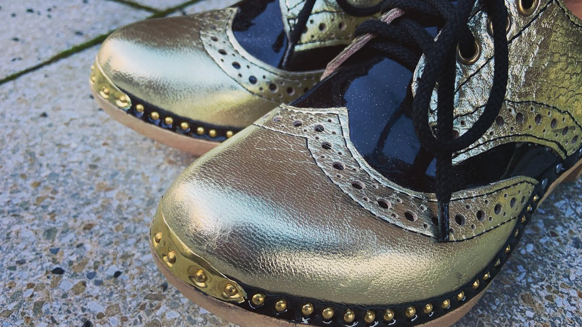 Simon recently received an order for three matching pairs of brogue clogs in black patent leather and metallic gold mock snakeskin