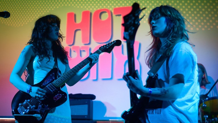 Two women on guitars - Hot Wax play Sunbird Records in Darwen