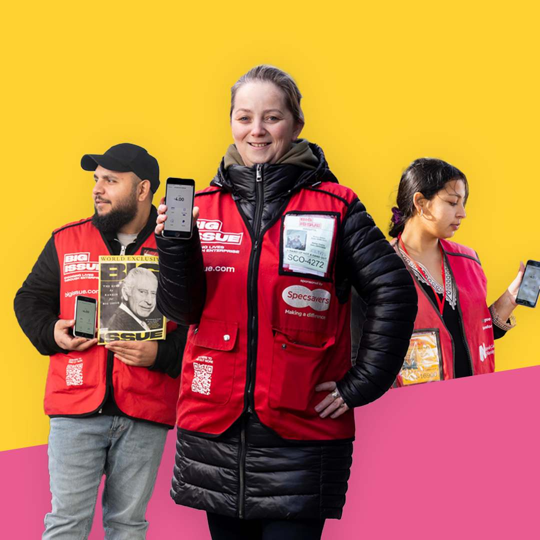 Three Big Issue vendors wearing red jackets stand confidently against a yellow background, each holding up a refurbished giffgaff phone. The vendor in the middle displays a magazine with the Big Issue logo, while the others show the phone screens to the viewer.