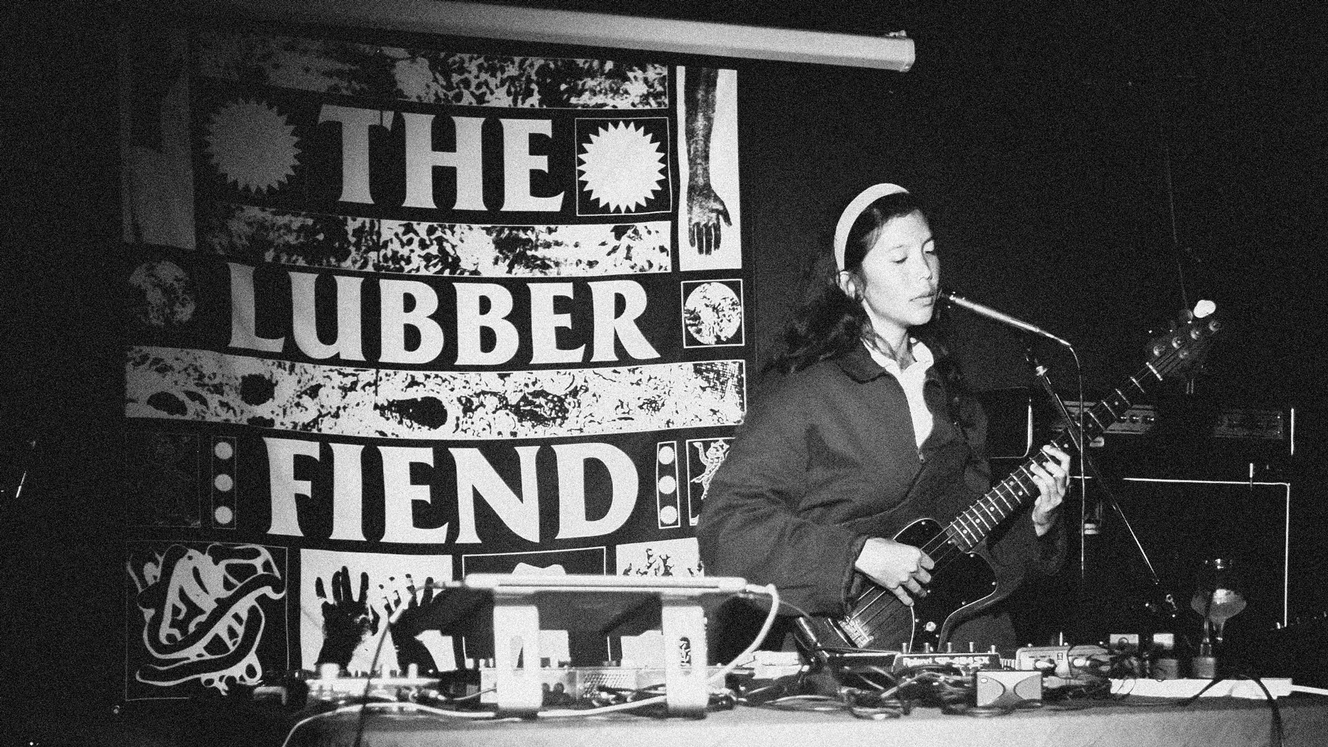 a young woman performs on stage at The Lubber Fiend in Newcastle