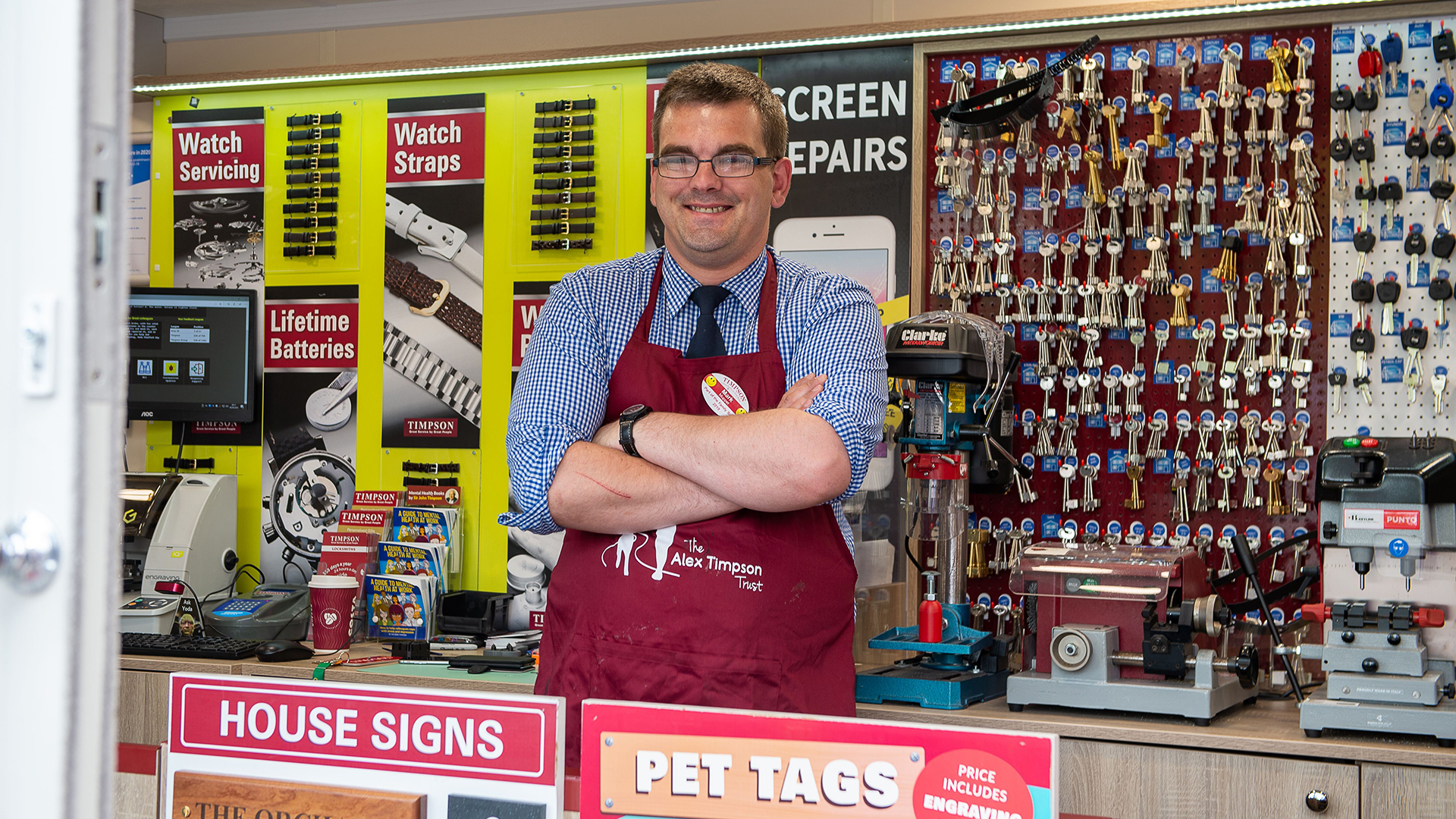 A happy Timpsons employee in Dedworth, Windsor