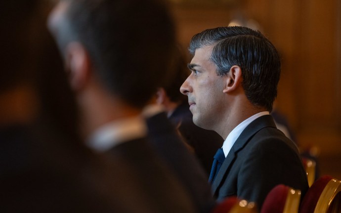 Side profile shot of prime minister Rishi Sunak chairing a meeting