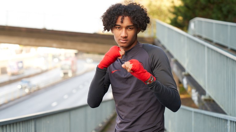 Young male teenagr Abdul, an alumni of Empire Fighting Chance, a boxing gym in Bristol