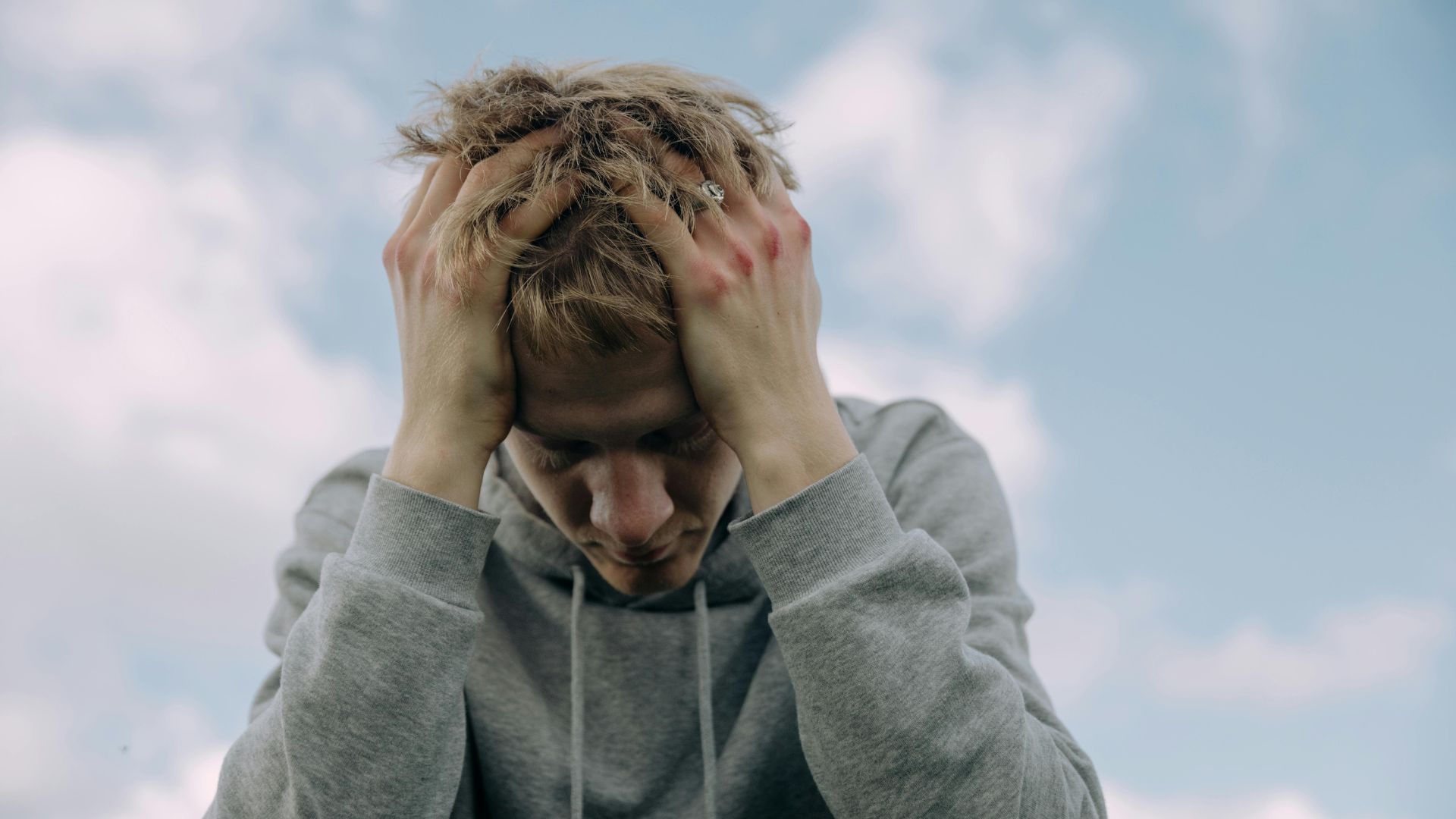 Man with head in his hands