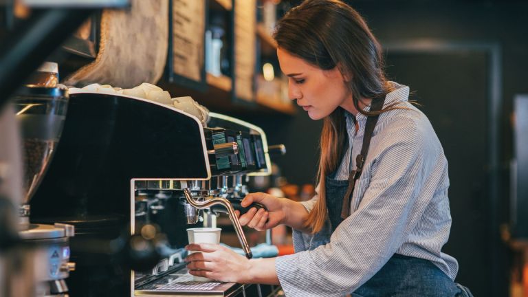 A barista at work. Insecure work can be expensive for employees