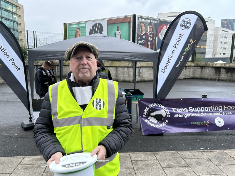 NUFC Fans Foodbank volunteer outside Newcastle United St James' Park stadium