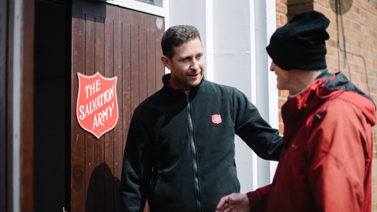 The Salvation Army worker with a man who has experienced homelessness