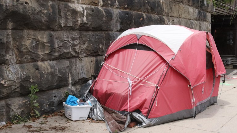 A homeless person's tent on the street