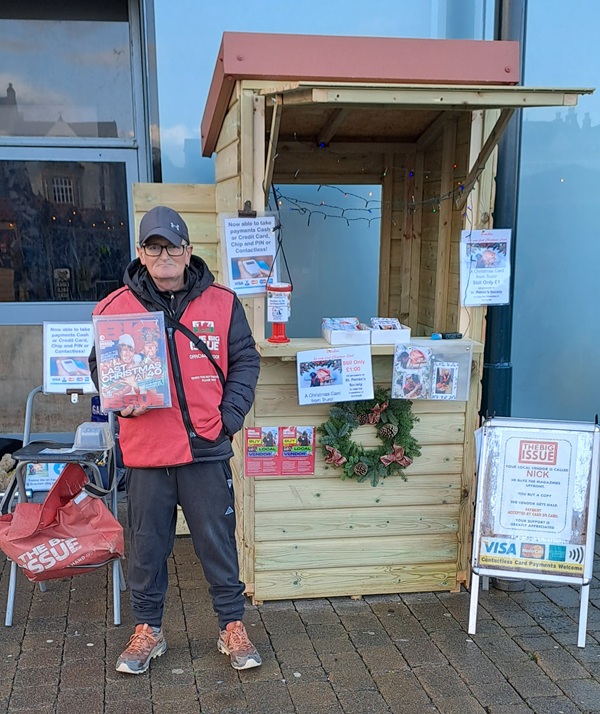 Big Issue vendor Nick Cuthbert outside his wooden hut