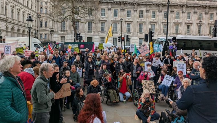 Disabled people protest benefits cuts at Downing Street ahead of the Spring Statement