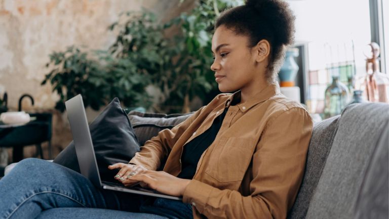 Stock image of a person using a laptop