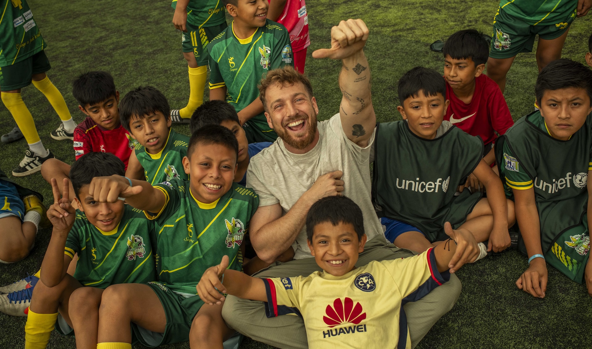 Sam Thompson joined children aged nine to 12 to play football at a UNICEF-supported football programme supporting children in Solola, Guatemala.