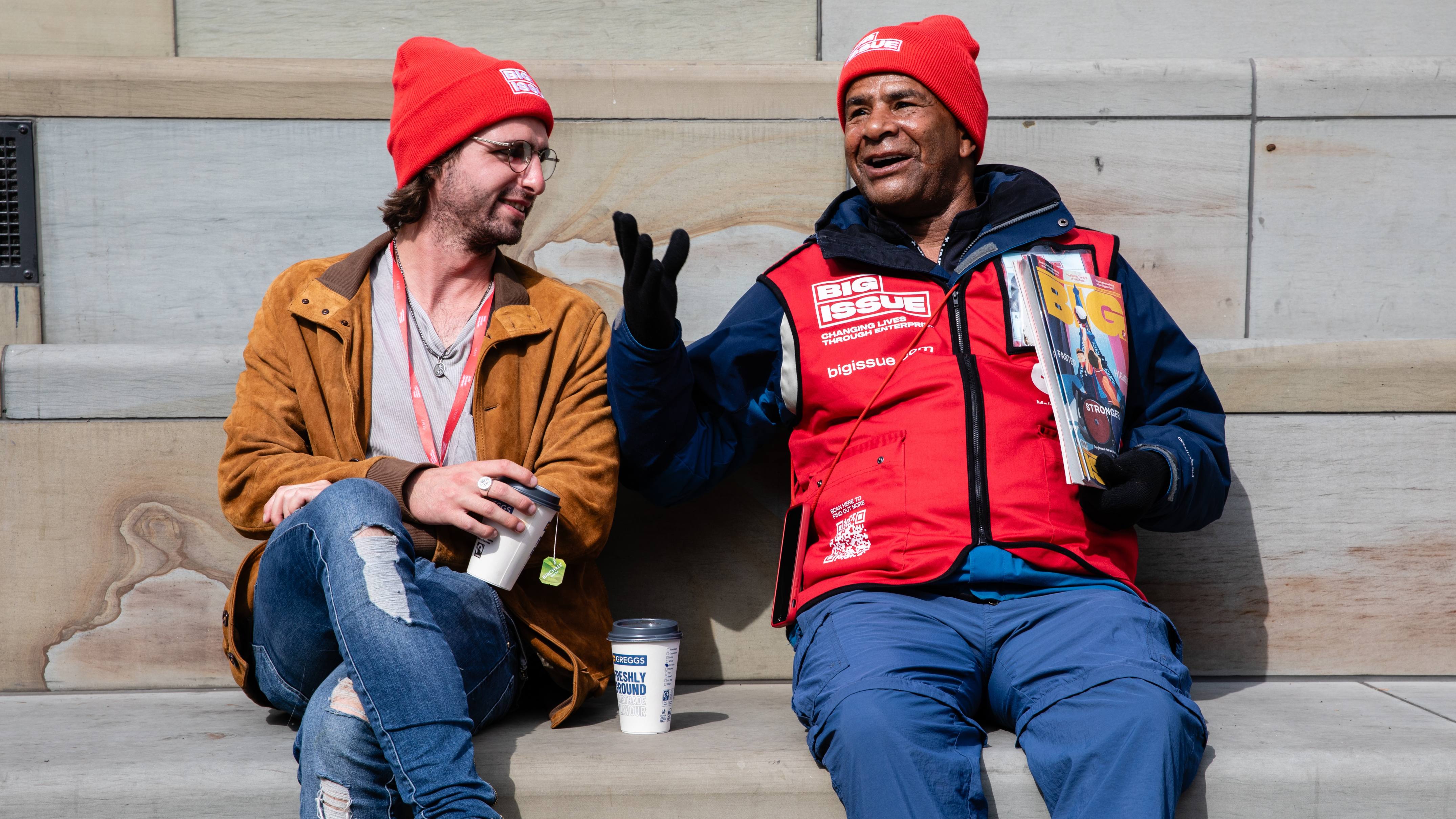 Support Worker talking to a Big Issue vendor