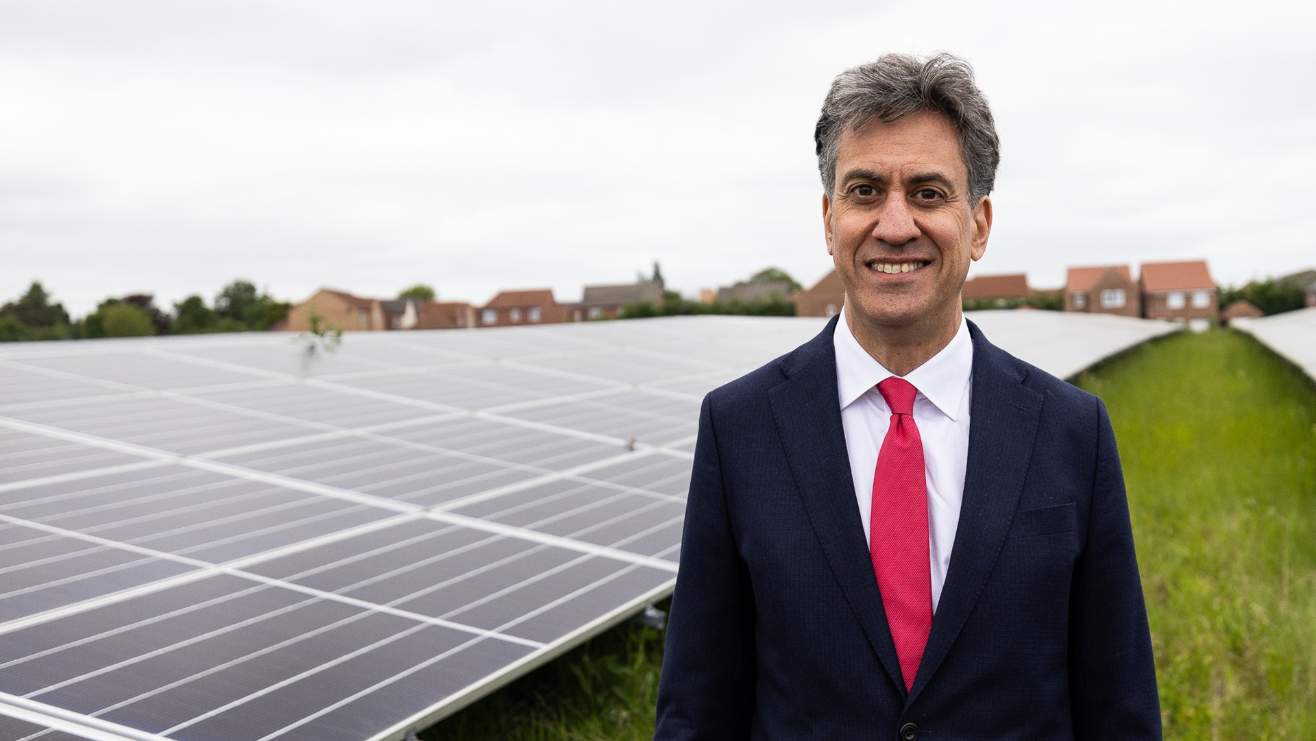 Energy secretary Ed Miliband with solar panels
