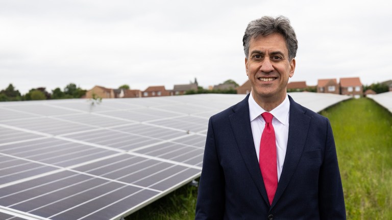 Energy secretary Ed Miliband with solar panels