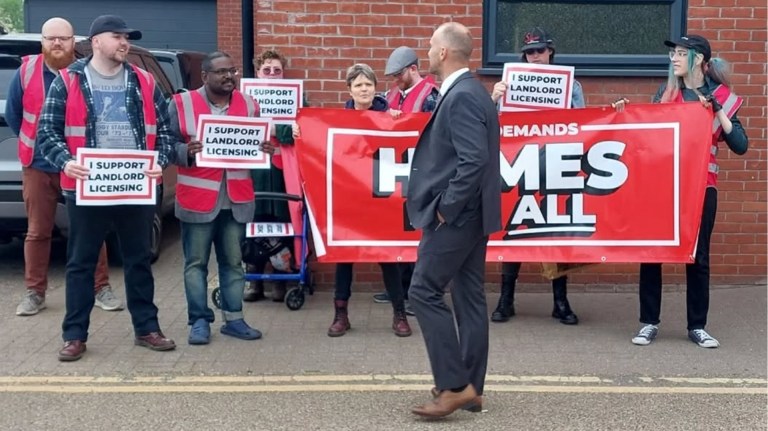 Renters from the Acorn Norwich branch confront a landlord in protest at a landlord conference