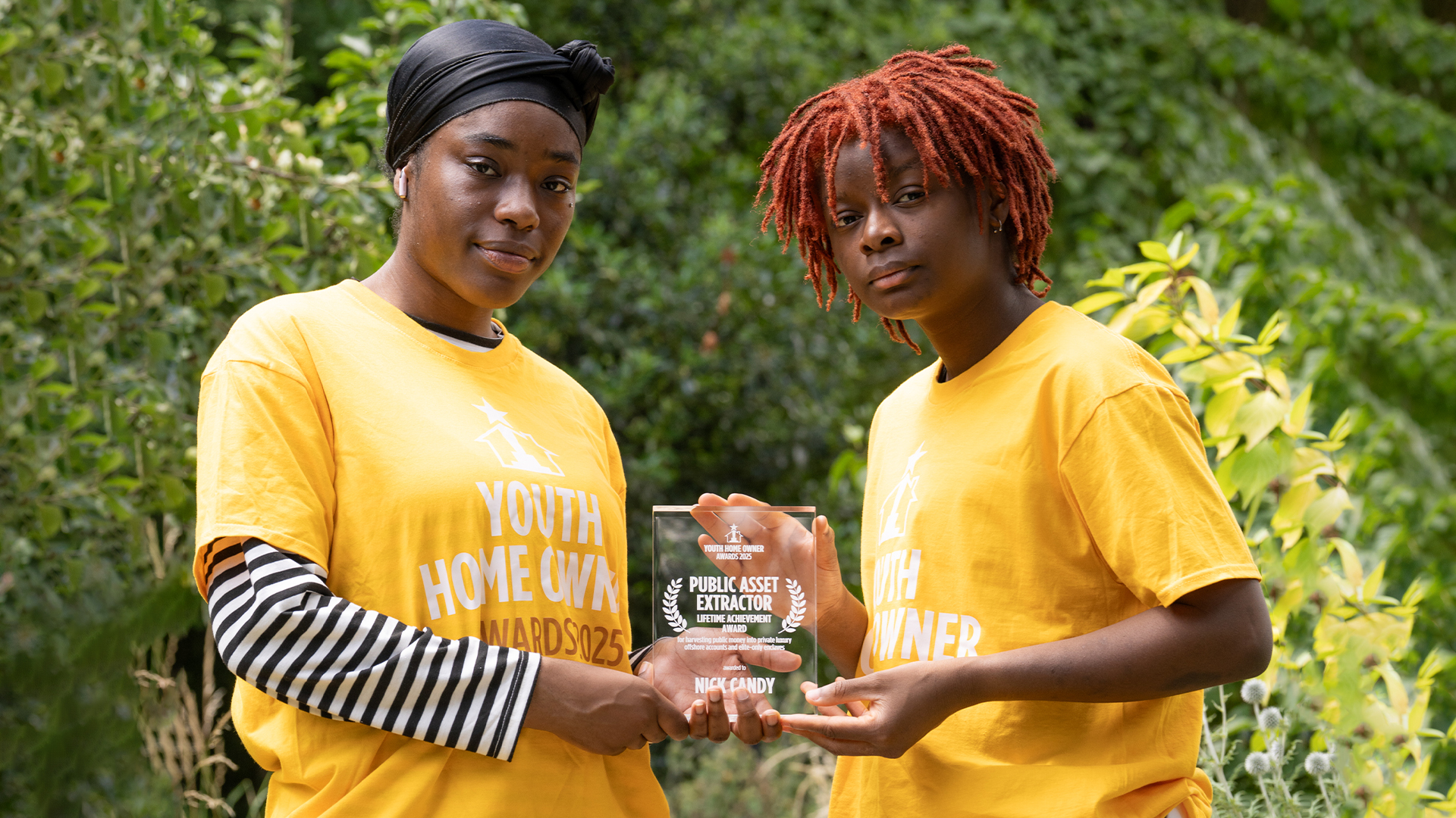 Two activists pictured with a Youth Home Owner Award