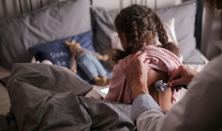 a child having pulse checked
