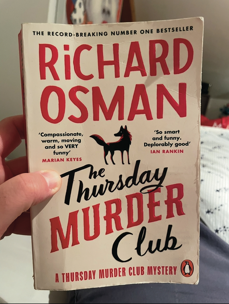 A thumbed copy of The Thursday Murder Club by Richard Osman