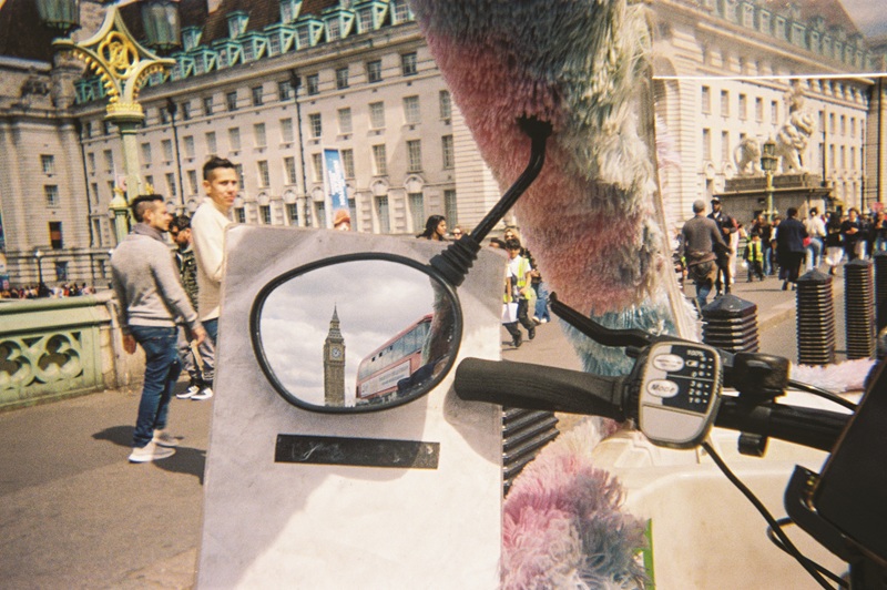 Big Ben shown in a bike mirror
