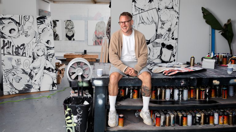 Opake sitting on a table in his studio