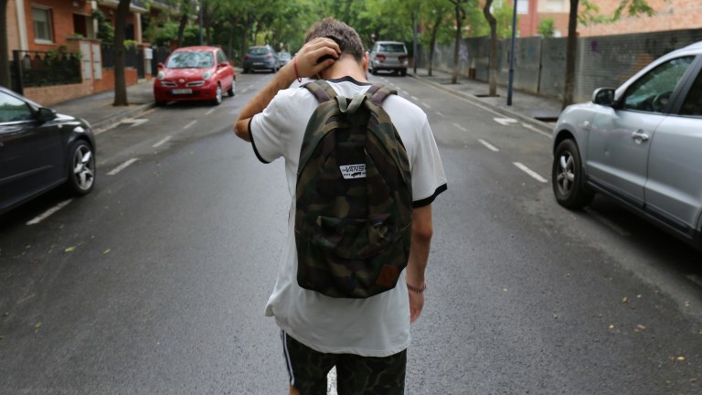 Boy wearing backpack