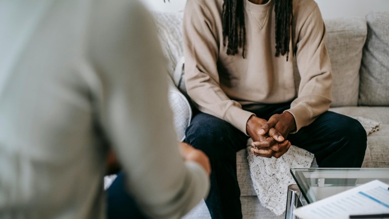 Image of man on therapy couch