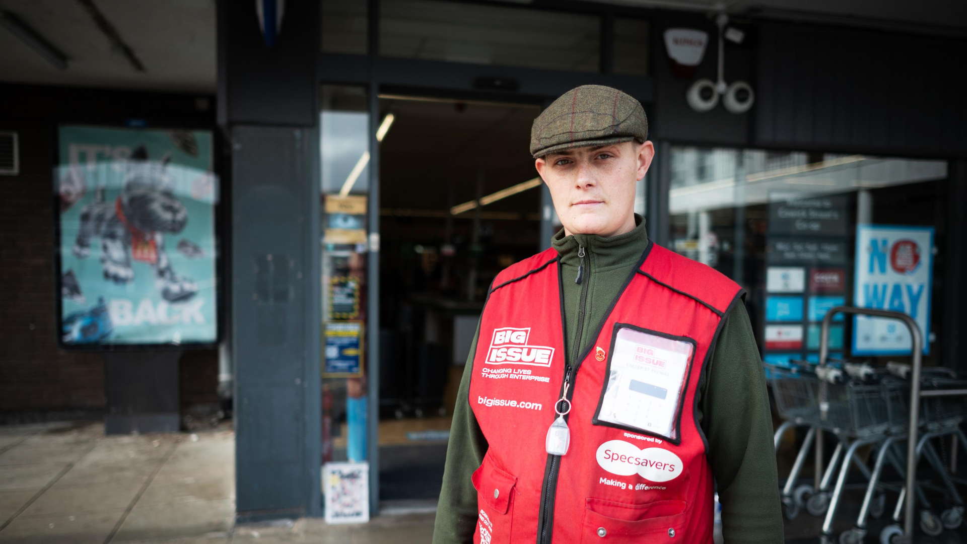 Big Issue vendor Alfie Brew stands outside Coop in Exeter, his pitch.
