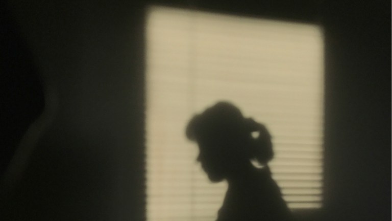 the shadow of a young girl