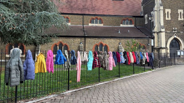 Barnardo's installation with 30 coats represents the 300,000 British children who could go without a coat this winter