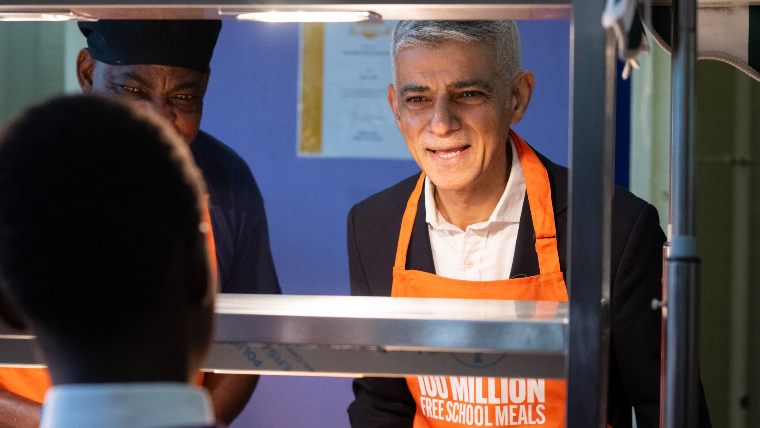 Sadiq Khan serves dinner