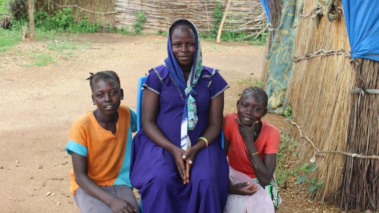 Image captured in July 2025 of a woman and two girls from Sudan who fled to South Sudan.